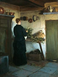 La esposa del artista arreglando flores